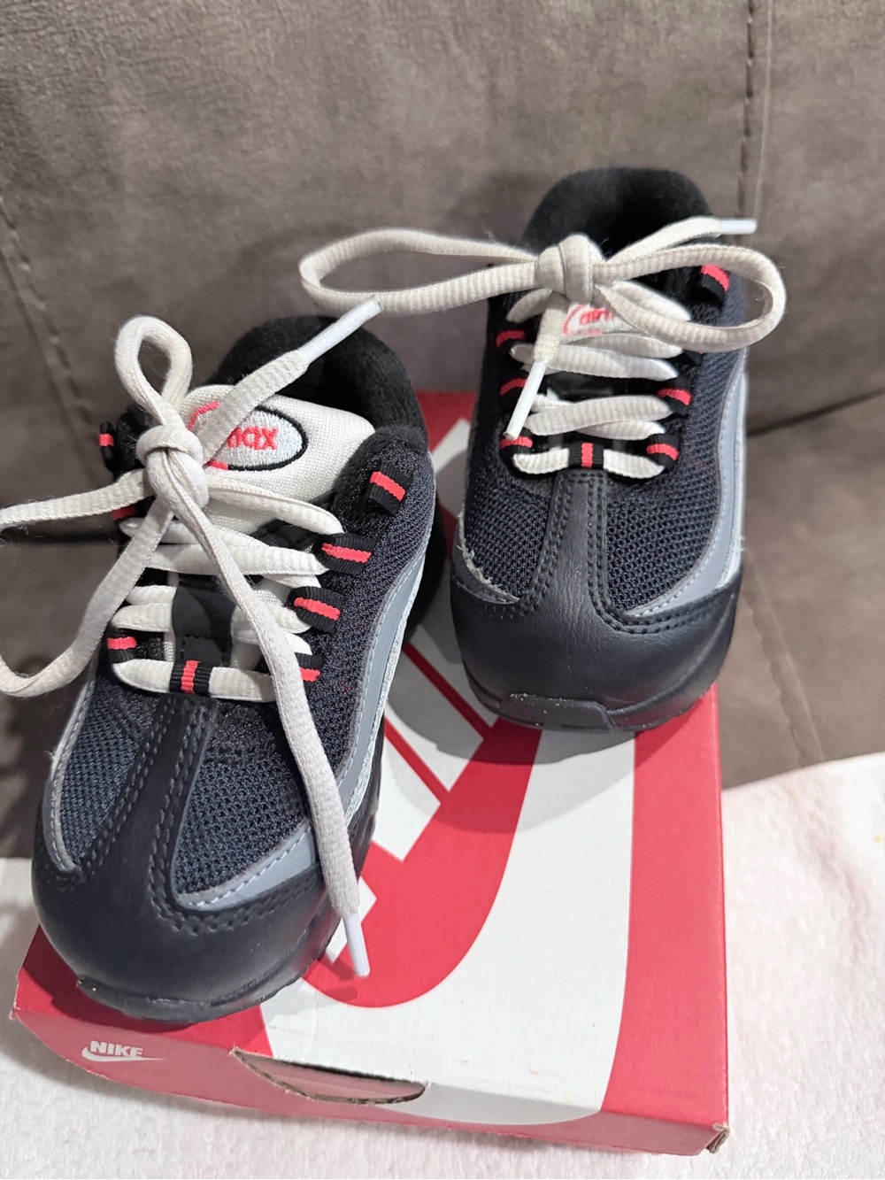 Nike Kids Black and Gray Sneakers with Pink Accents